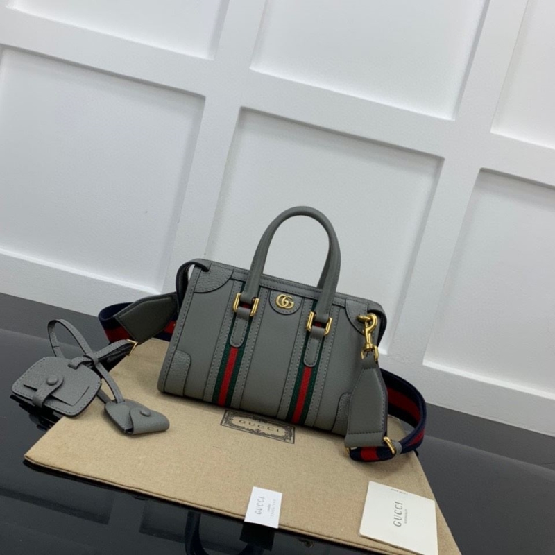 G*u*i top handle bags